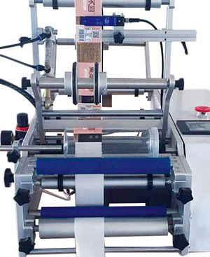 半自動(dòng)貼標(biāo)機(jī) 半自動(dòng)貼標(biāo)機(jī)